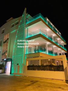 a building with a sign on the side of it at EUROPA Hotel in Vasto