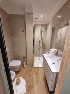 Kúpeľňa v ubytovaní Hotel Calypso