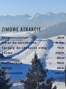 zdjęcie jeziora z górami w tle w obiekcie Między OWCAMI w mieście Sromowce Wyżne