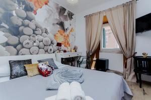 Postel nebo postele na pokoji v ubytování Guesthouse Mimbelli