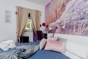 Postel nebo postele na pokoji v ubytování Guesthouse Mimbelli
