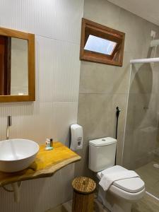 Kylpyhuone majoituspaikassa Pousada Corais do Bitingui