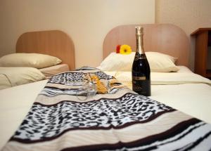 Postel nebo postele na pokoji v ubytování Hostel Fortuna