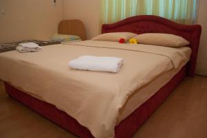 Postel nebo postele na pokoji v ubytování Hostel Fortuna