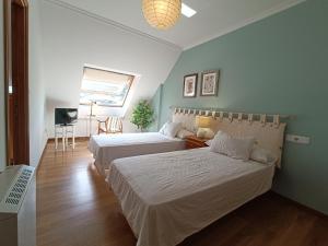 Postel nebo postele na pokoji v ubytování Penthouse Panorámico