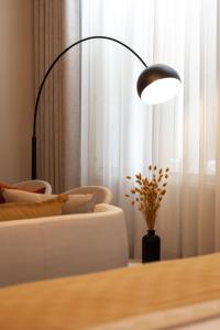 Postel nebo postele na pokoji v ubytování Boutique Hotel Kint