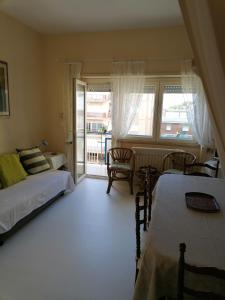 A bed or beds in a room at Luminoso Appartamento A 80 Metri dal Mare