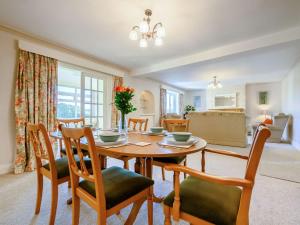 a dining room with a table and chairs at 3 Bed in Cockermouth 89139 in Aspatria