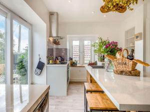 a kitchen with a counter with a basket on it at 4 Bed in Bath 89616 in Mells