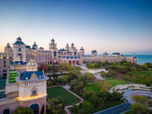 an aerial view of the hilton resort and casino at Hilton Dalian Golden Pebble Beach Resort in Jinzhou