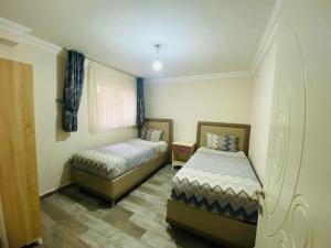 Katil atau katil-katil dalam bilik di Melodi Hotel