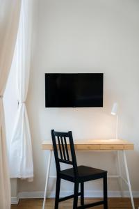 TV a/nebo společenská místnost v ubytování Danylo Inn