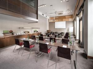 a conference room with a long table and chairs at Clarion Hotel Prague Old Town in Prague