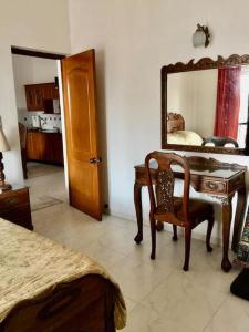 Postel nebo postele na pokoji v ubytování FlyHigh Holiday Homes near Baga Beach