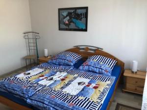 Кровать или кровати в номере Haus Nordseewind