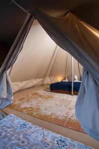 Grootfontein Camping Villa's tesisinde bir odada yatak veya yataklar