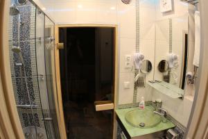 
Ванная комната в Apartment Mokhovaya 30 with Sauna
