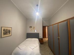 Postel nebo postele na pokoji v ubytování La casa del Professore - Downtown luxury stay
