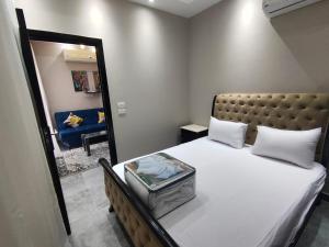 Кровать или кровати в номере Luxury Host -219- Dream Land