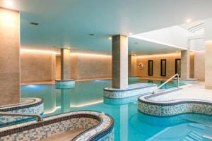 a pool in a hotel with three swimming pools at The Celtic Royal Hotel in Caernarfon