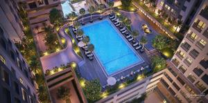 an overhead view of a large swimming pool in a city at SNOW`S HOUSE in Ho Chi Minh City