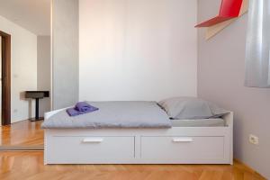 Кровать или кровати в номере SEASCAPE