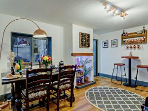 a dining room with a table and chairs in a room at 2 bed property in Bury St Edmunds 90090 in Rattlesden