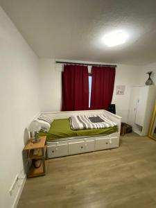 Postel nebo postele na pokoji v ubytování Apartment mit Doppelbett in Bonn