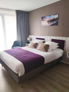 Postel nebo postele na pokoji v ubytování Best Western Plus Hôtel la Rade