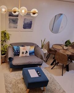 A seating area at Cassie Homestay - Yuna Door 2 - Furnished Home in Butuan