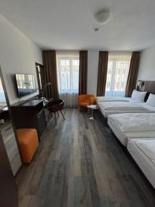 Voodi või voodid majutusasutuse Hotel Fackelmann toas