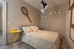 Postel nebo postele na pokoji v ubytování Terrazza delle Giare