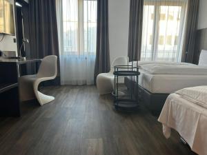Voodi või voodid majutusasutuse Hotel Fackelmann toas