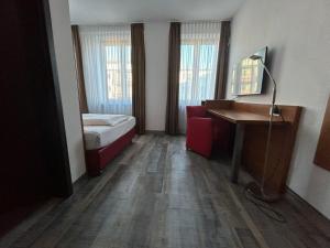 Voodi või voodid majutusasutuse Hotel Fackelmann toas