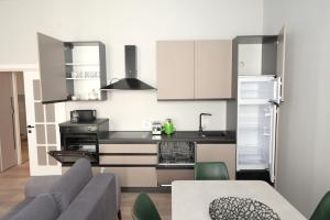 Køkken eller tekøkken på Umbrella Street Center Luxury 2 Bedroom