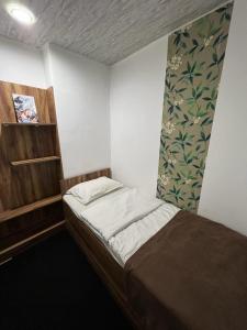 Katil atau katil-katil dalam bilik di Elno hotel