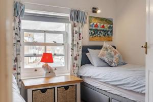 Ένα ή περισσότερα κρεβάτια σε δωμάτιο στο Westway House