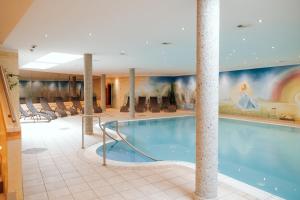 The swimming pool at or close to Hotel Glockenstuhl