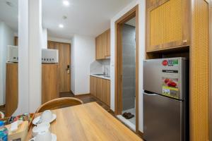 Kuchyň nebo kuchyňský kout v ubytování Studio-Vincent Apartment HaNoi