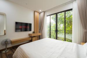 Postel nebo postele na pokoji v ubytování Studio-Vincent Apartment HaNoi