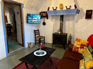 Televisyen dan/atau pusat hiburan di Cuevas La Veranda