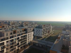 an aerial view of buildings in a city at 1 room Apartment with terrace, Petržalka in Bratislava