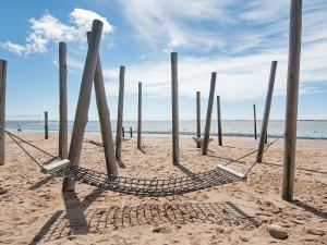 a hammock in the sand on a beach at 2 person holiday home in Esbjerg V in Esbjerg