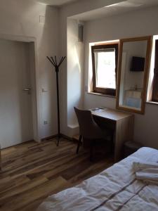 Postel nebo postele na pokoji v ubytování Čuček Guesthouse
