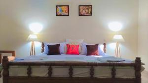 Ένα ή περισσότερα κρεβάτια σε δωμάτιο στο Jungle Heritage