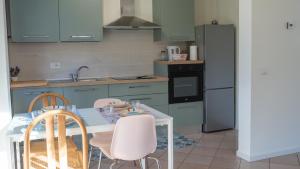 Küche/Küchenzeile in der Unterkunft La Voce del Bosco