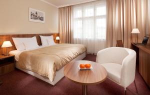 Rúm í herbergi á Clarion Hotel Prague Old Town