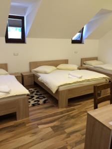 Кровать или кровати в номере Čuček Guesthouse