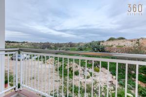a view from the balcony of a house at Beautiful 3-bed home with Greenery Views in Mgarr by 360 Estates in Mġarr