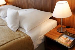 Rúm í herbergi á Clarion Hotel Prague Old Town